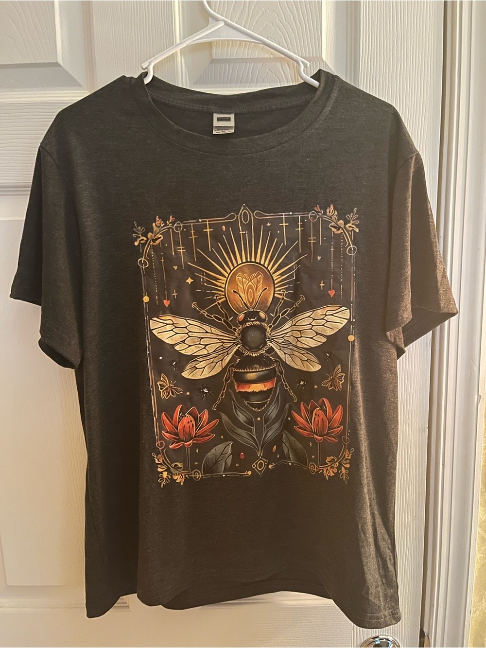 Graphic dark gray Bee Motif T‑Shirt with Gold & Red Accents. NWOT